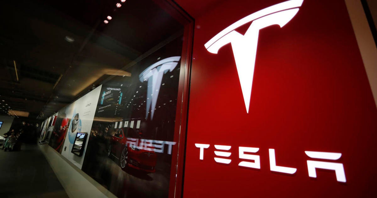 Tesla 4Q earnings fall below Wall Street expectations, despite record sales